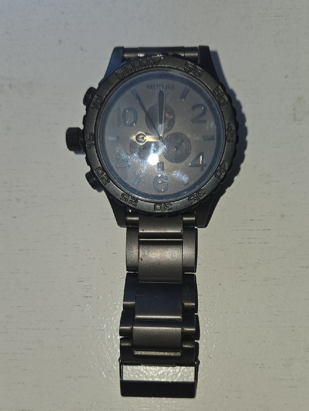 Nixon dark gunmetal stainless chronograph watch